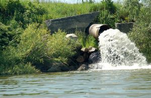 Sewage discharge into river